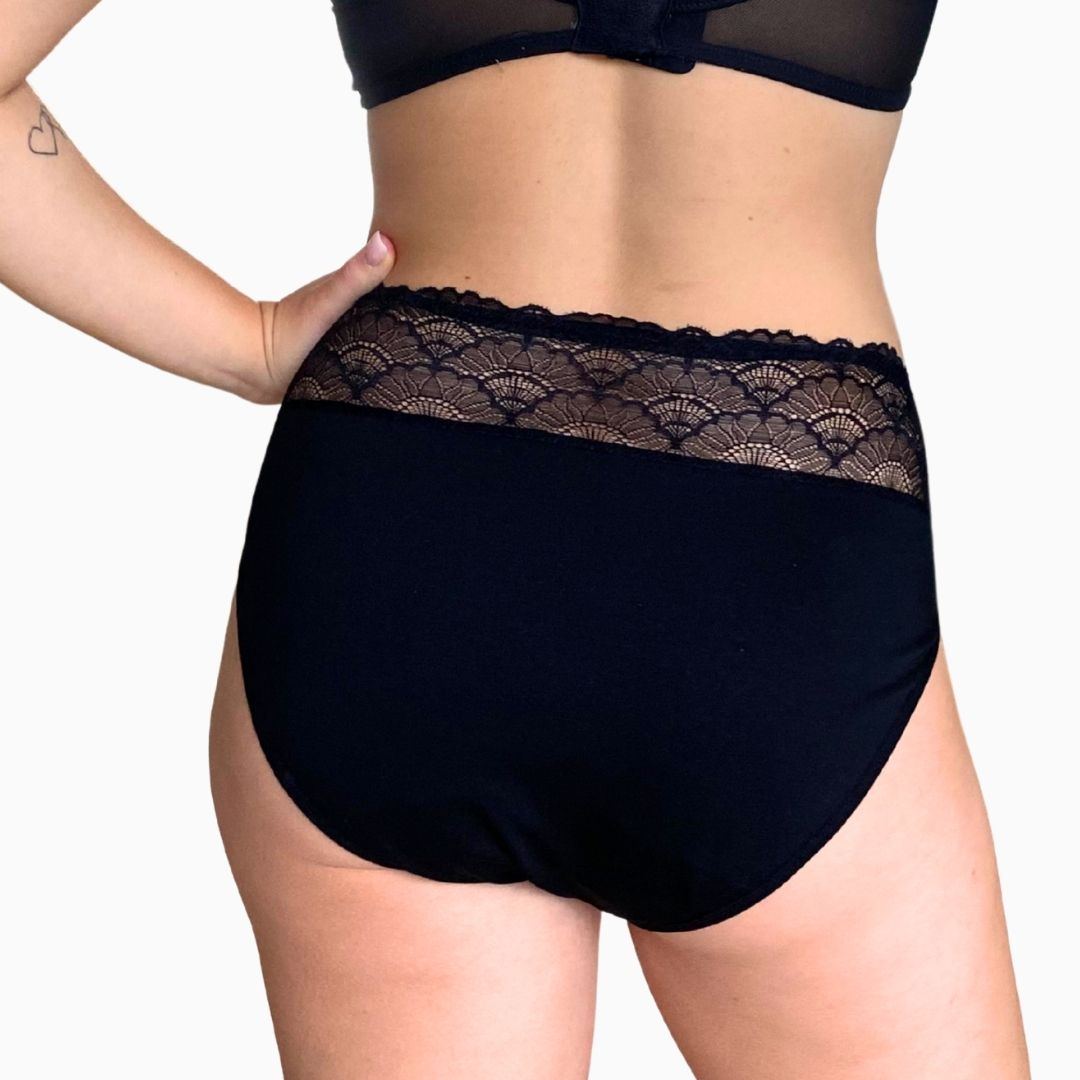 menstrosa på kropp bakifrån 